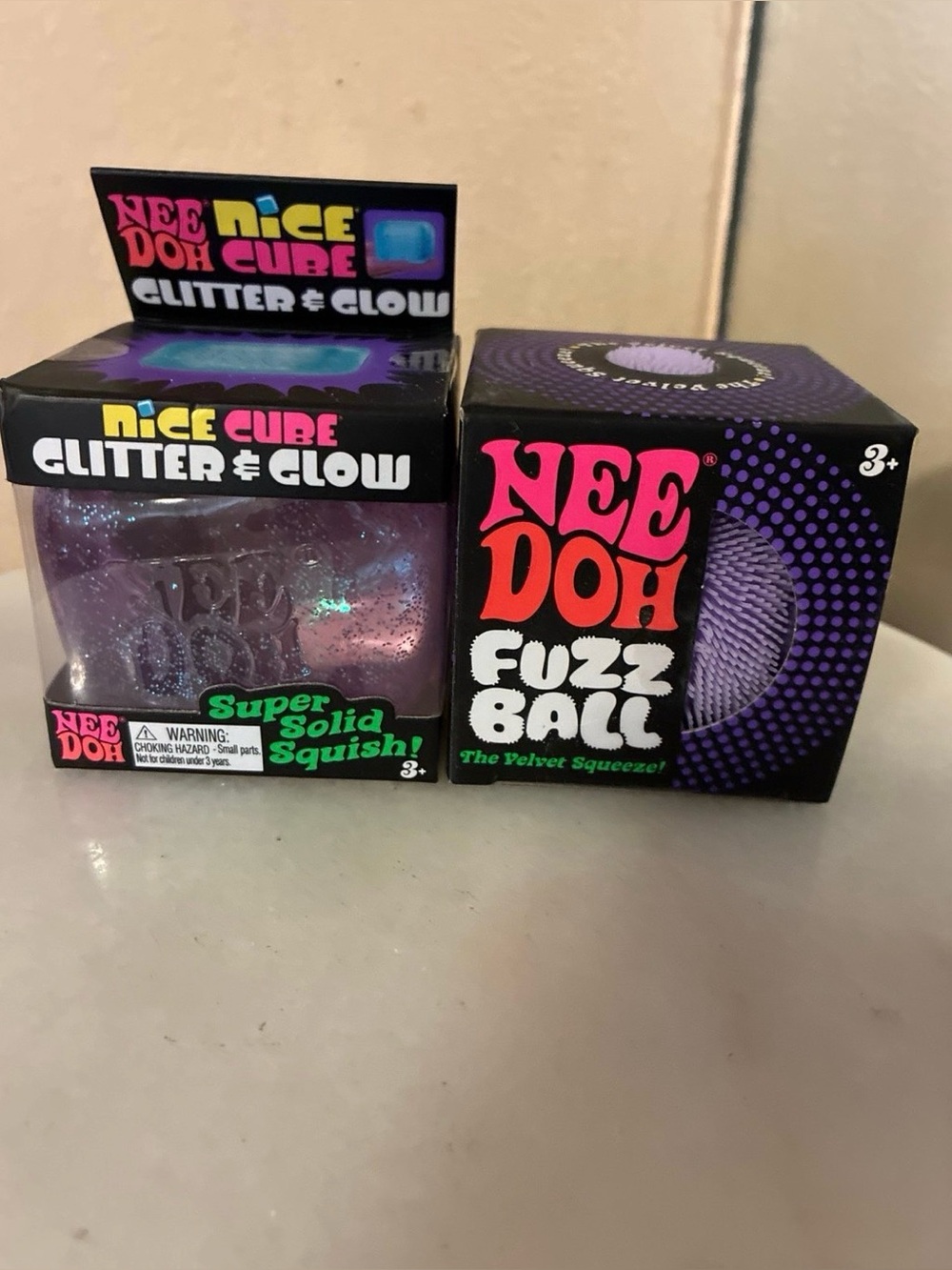NeeDoh Glitter & Glow Nice Cube + Fuzz Ball - Purple